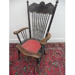 An early 20th Century spindle back armchair, possibly American.