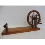 A 19th Century decorative fruitwood table wool winder, 19 1/4 x 6".