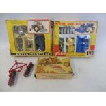 Two boxed Britains accessory packs, appear near complete, plus a boxed disc harrow.