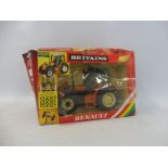 A boxed Britains rainbox pack circa 1984 9518 Renault tractor, box poor, model appears excellent.