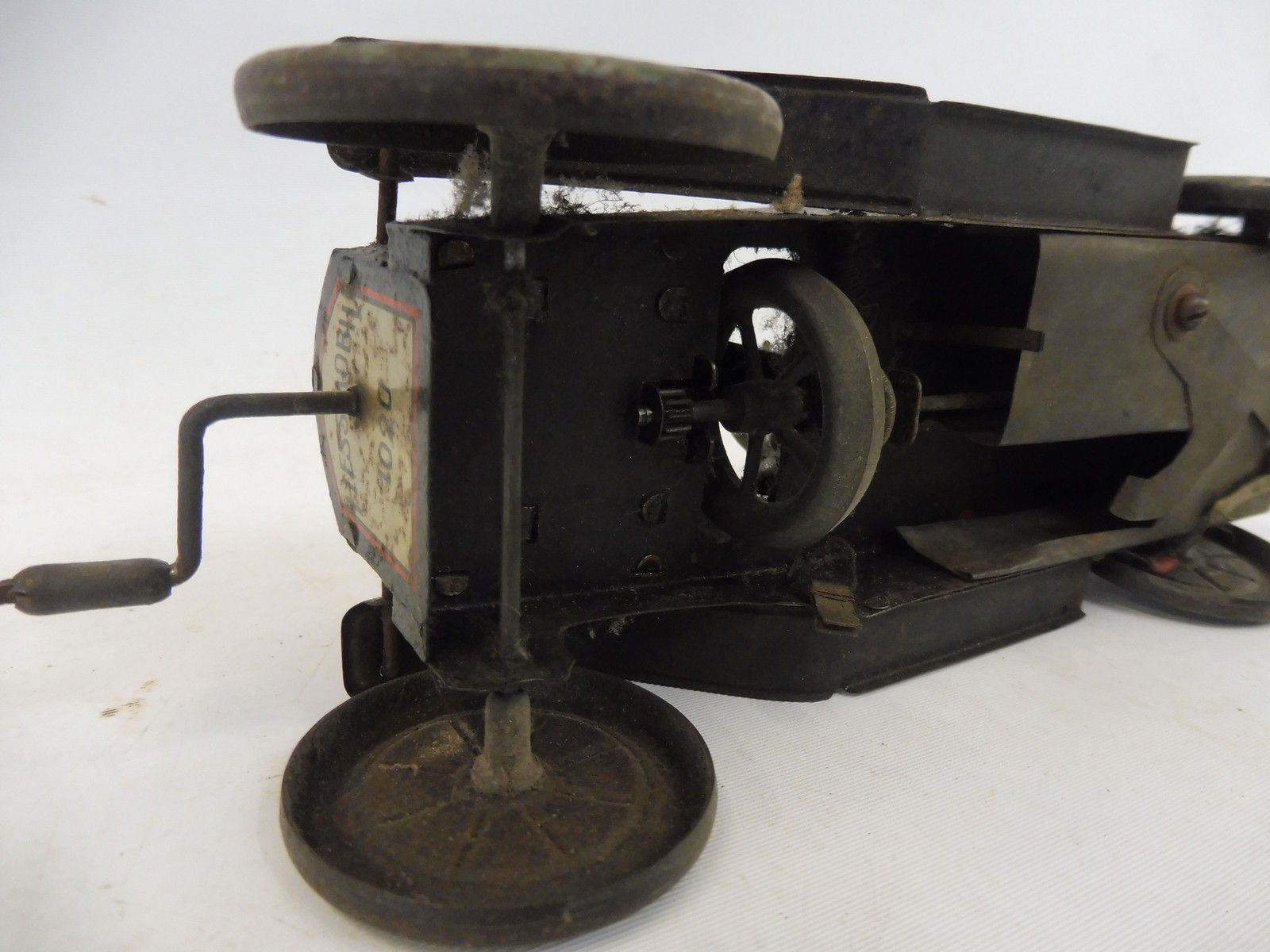 An early tinplate clockwork model car 'Hessmobil 1020'. - Image 8 of 8