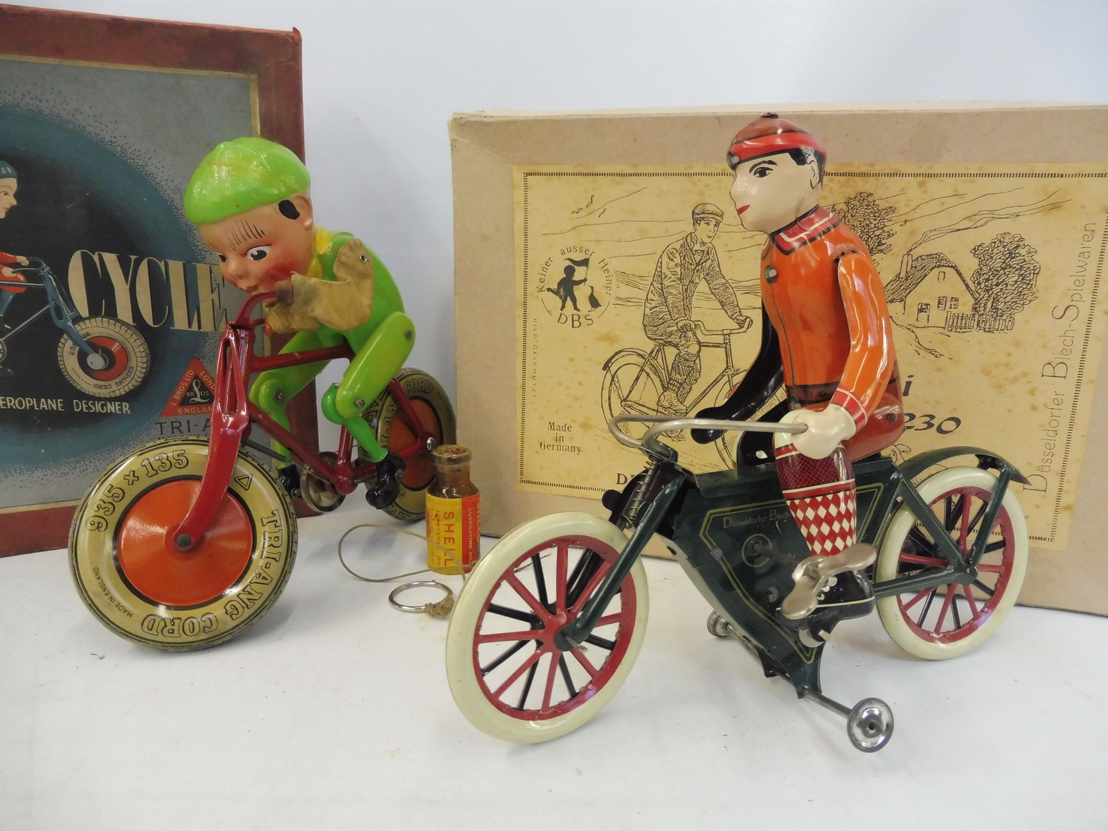 A boxed Tri-ang Gyro-Cycle and a boxed German 'Rolli 230' tinplate bicycle. - Image 2 of 6