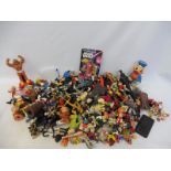 A large quantity of period plastic figures to include wrestling, Star Wars and many other genres.