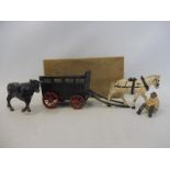 An original boxed ox-drawn cart, overall poor condition paper lid missing.