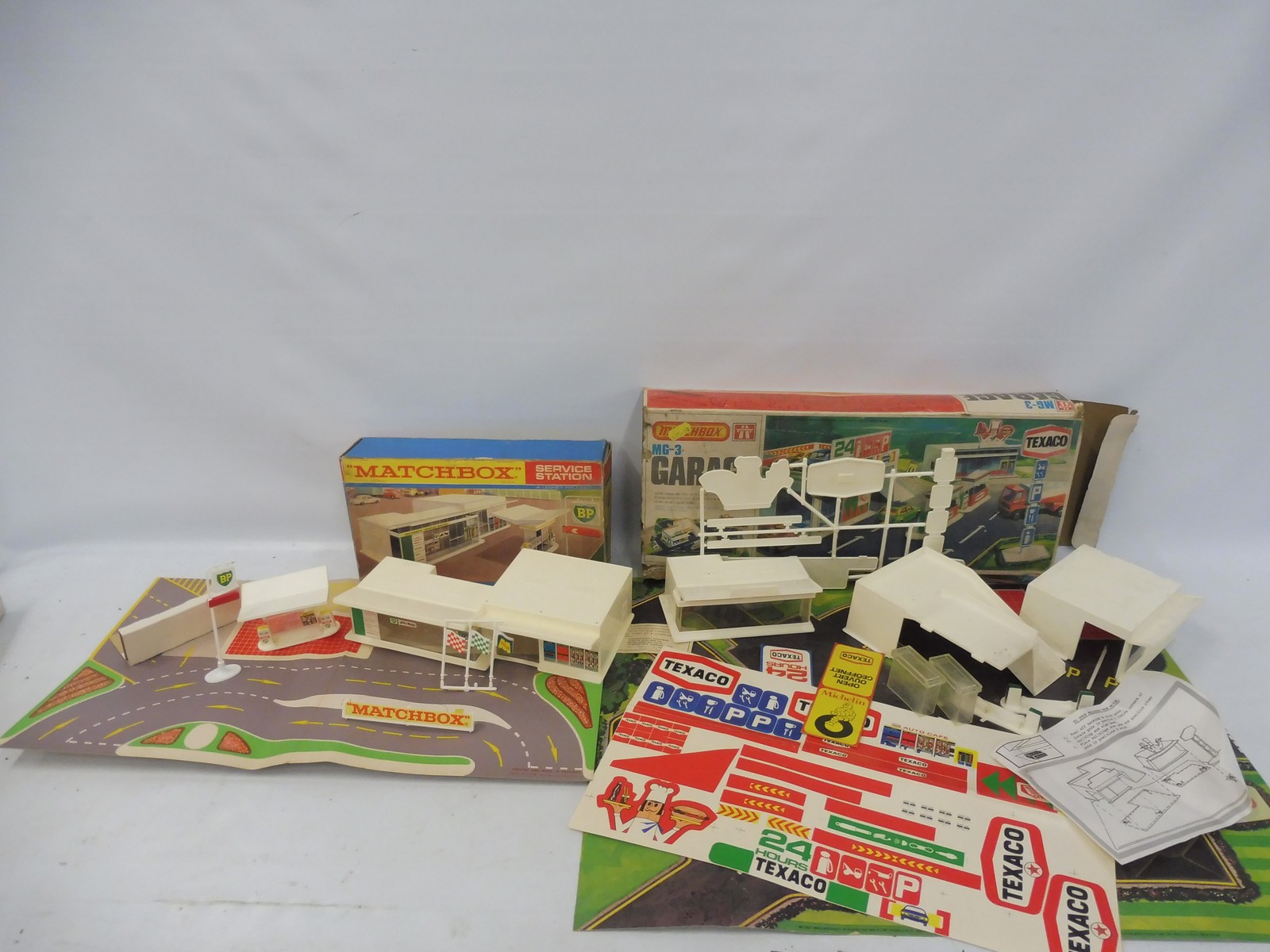 A boxed Matchbox Service Station, MG-1, by Lesney, with inner box and a Matchbox Garage, MG-3.