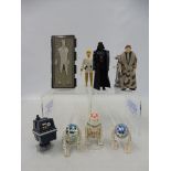 Nine original Star Wars figures, to include Han in carbonite, Vader with original cape and phaser,