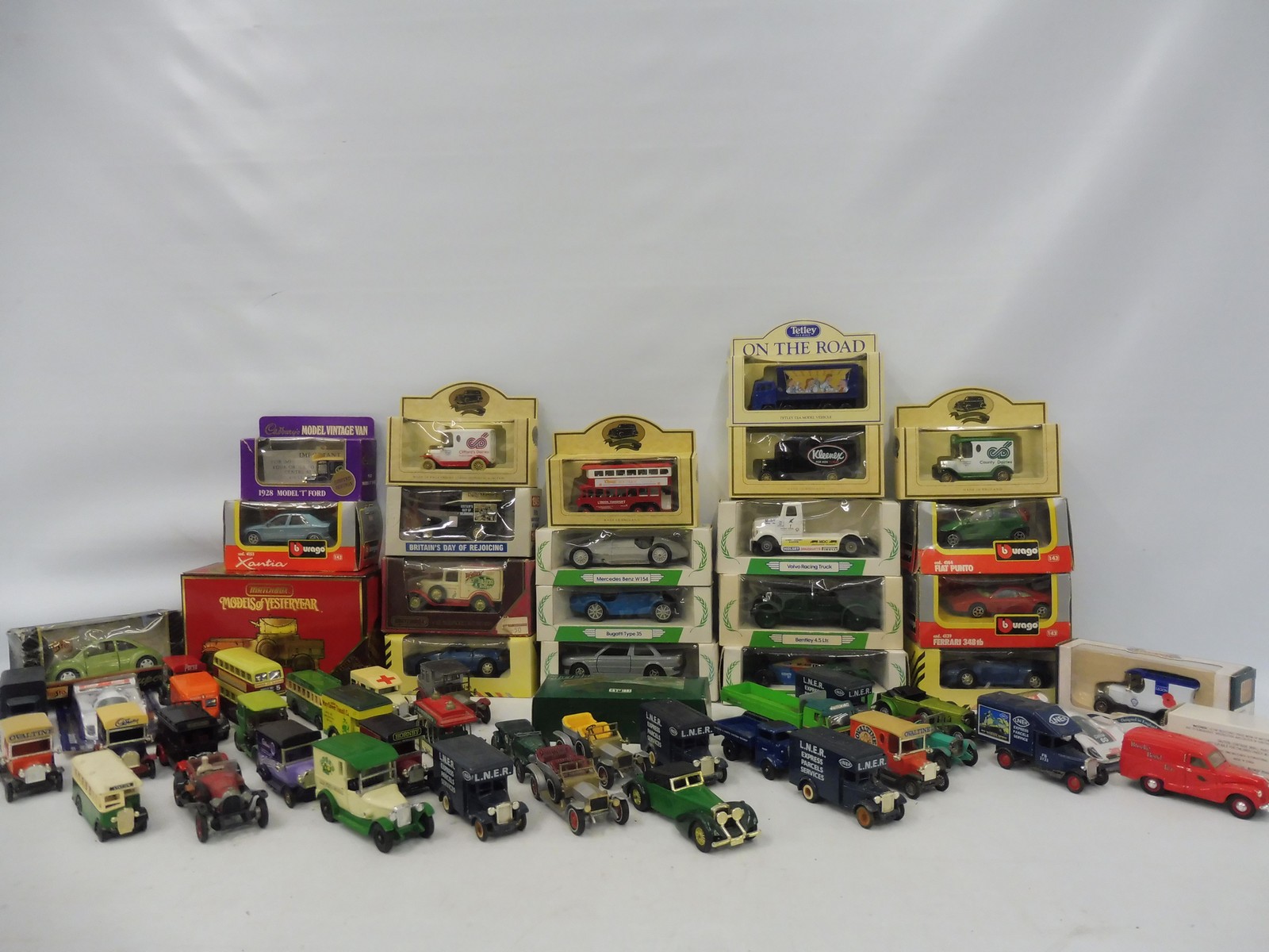 A box of playworn die-cast models, various makers including Matchbox and Corgi, mainly boxed.