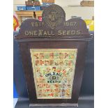 A rare Victorian One & All Seeds seeds counter top dispensing cabinet, 29" w x 62 1/2" h x 5" d.