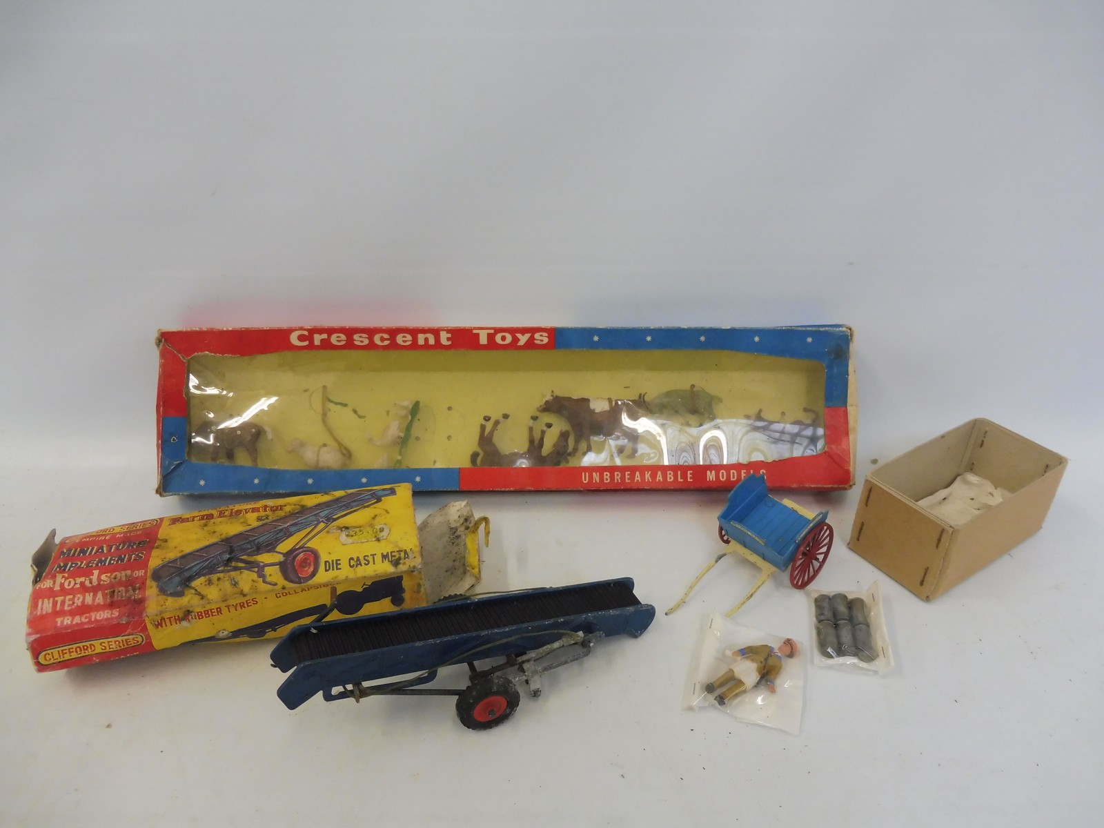 A circa 1950s Crescent toy, boxed farm animals, box in good condition for age, no. 586, plus some