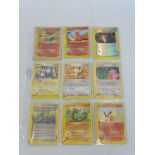 Pokemon 9 E-series Holo's, commons and trainer, inc. Holo Flareon good condition.