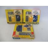 Three boxed Britains accessory packs, hay bales, tipping transporter etc.