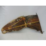 An original circa 1920s/1930s painted wooden frightened horse head, double sided with metal mounting