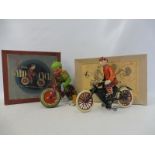 A boxed Tri-ang Gyro-Cycle and a boxed German 'Rolli 230' tinplate bicycle.