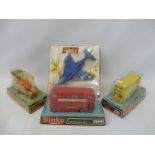 Four circa 1970s boxed Dinky Toys, to include the F4K Phantom, Routemaster bus, the Aveling Roller