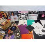 A selection of vinyl LPs across many genres, drum and bass, 1980s, lots of artists, plus a
