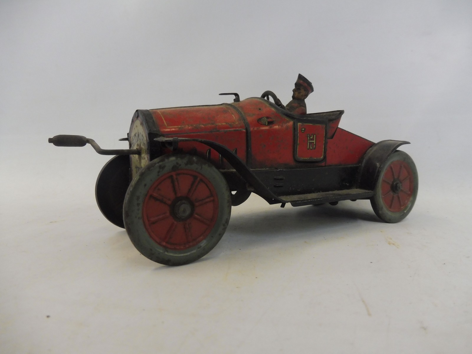 An early tinplate clockwork model car 'Hessmobil 1020'. - Image 3 of 8