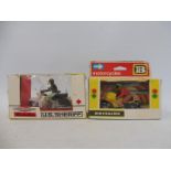 Two boxed Britains motorcycles, US Sheriff Harley Davidson and Moto Cyclette.
