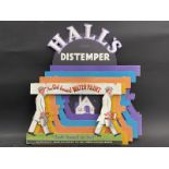 A very rare Hall's Distemper die-cut multi-layered three dimensional showcard of bright colour and