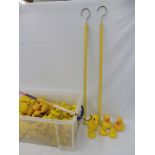 A large quantity of original fairground hook-a-ducks with painted hooks.