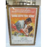 A large scale cinema poster Gone with the Wind, starring Clarke Gable, in an early wooden frame.