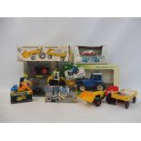 A selection of boxed agricultural tractors, different scales and models to include Siku, Tomica