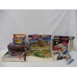 A quantity in three trays of plastic toys to include a boxed Thunderbirds Tracy Island, also