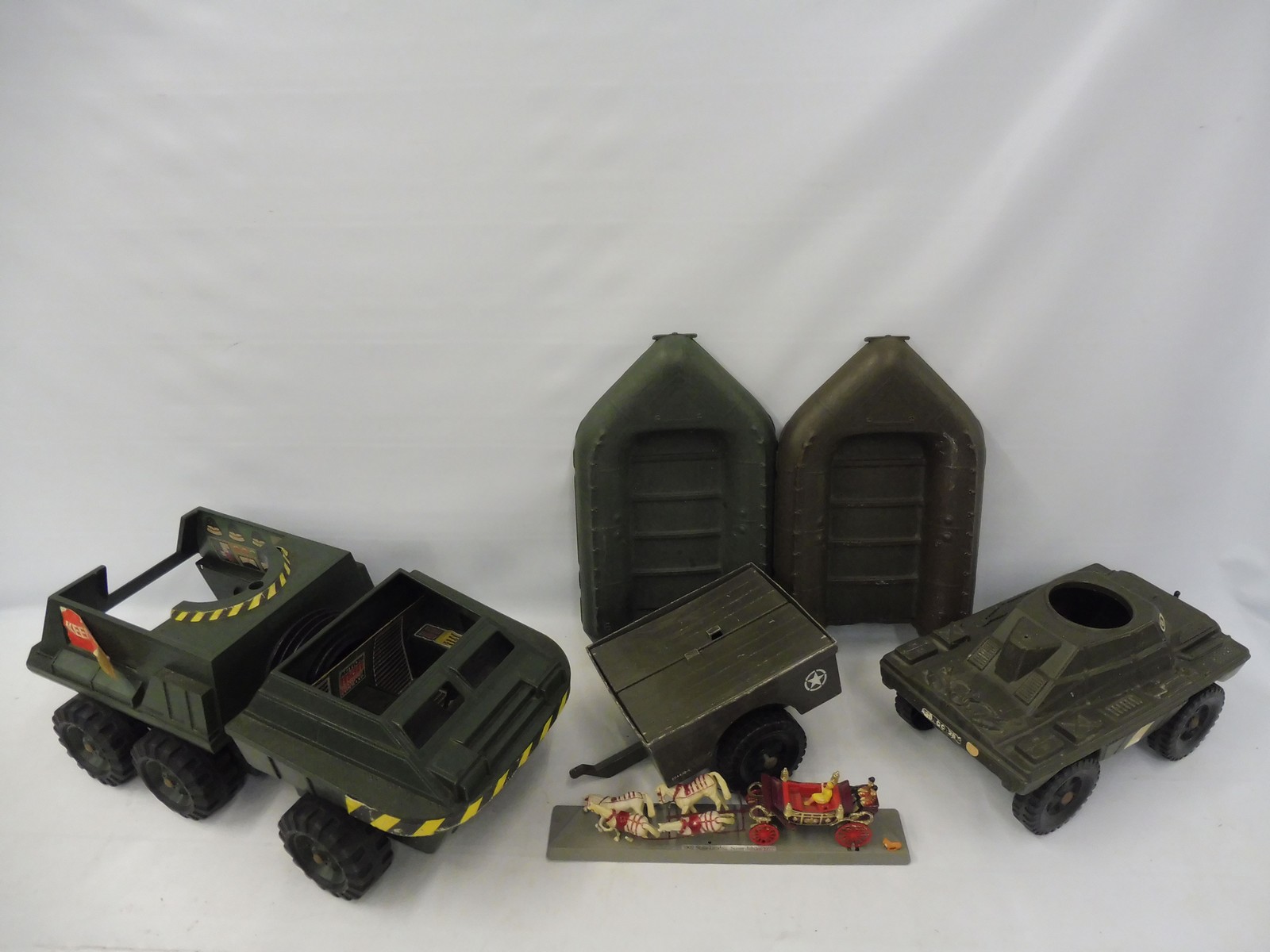 A selection of Action Man vehicles to include a boxed Jeep.