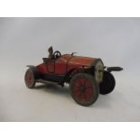 An early tinplate clockwork model car 'Hessmobil 1020'.