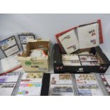 Two boxes of assorted stamps, mostly first day covers, some signed, also The Postmark Club issues.