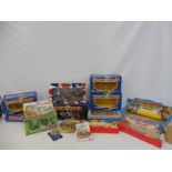 A box of assorted models including boxed Britains Task Force and carded animals, plus two boxes of