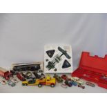 A quantity of die-cast and other toys including a boxed Atlas aircraft, Matchbox carry case with