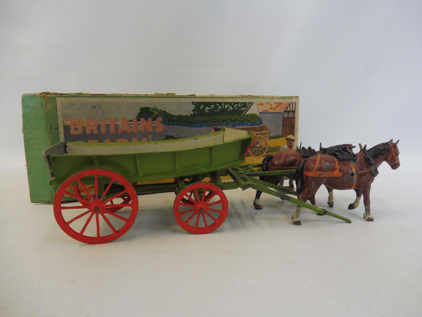 An early Britains farm wagon, box no 5F, in playworn condition but appears complete. - Image 3 of 4