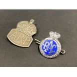 A hallmarked silver A.R.P. badge plus an R.A.C. lapel badge.