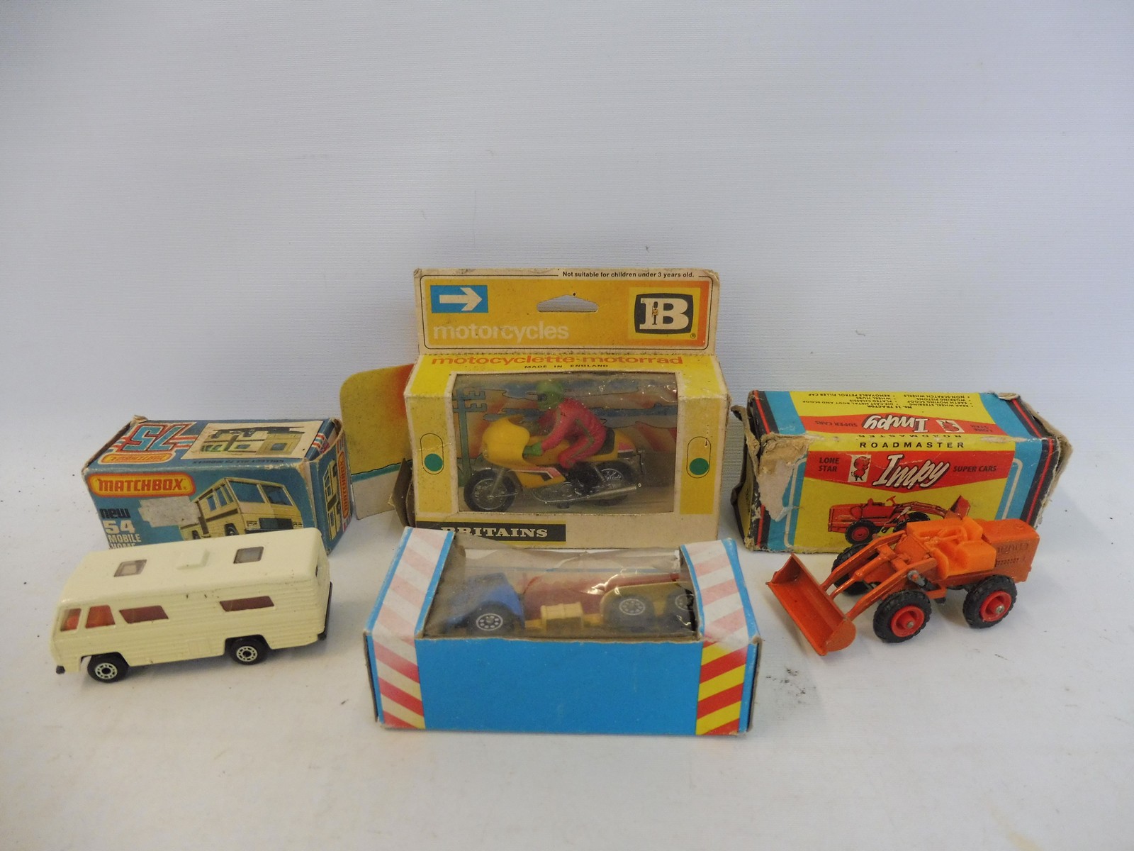 A mixed lot of Britains, Impy and Matchbox to include a Britains motorcyclet.