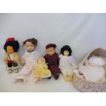 Two composite dolls, a Kader plastic doll, an unusual felt Inuit doll etc.