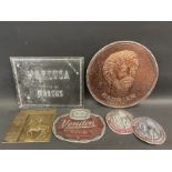 Six 'bronze' embossed adverts/showcards including Hadrian, Marcusa etc.