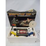 A Scalextric 200, appears complete and in very nice condition, plus an extra car, a Ferrari 312.