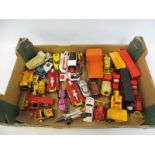 A tray of larger scale playworn die-cast models including Corgi, Dinky etc.