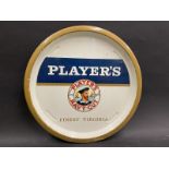 A Player's Navy Cut part pictorial tin tray with central sailor image, 12 1/2" diameter.