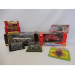 A selection of boxed die-cast models, mixed scales, including Maisto, Revell etc.
