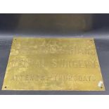 A brass name plaque for 'Reg. C. Graham Dental Surgery', 18 x 12".