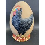 An unusual egg-shaped shop advertising display promoting De Kuyper Black Hen Advocaat, 5" w x 8 " h.