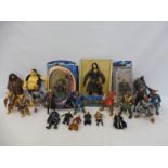 Action Figures in one box to include boxed Lord of the Rings and assorted loose figures.