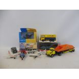 A small box of die-cast commercial vehicles, plus a small box of die-cast planes etc.