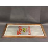 A Fry's Extra Cream Milk Chocolate narrow advertising mirror in an oak frame, 11 1/2 x 29 3/4".