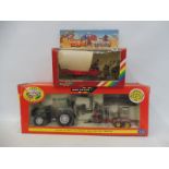 Two Britains Rainbox packs, Wild West covered wagon action set, the other the Valtra Valmet