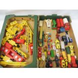 A collection of die-cast and plastic vehicles, various makers.