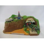 A Tracy Island plastic set with three models.