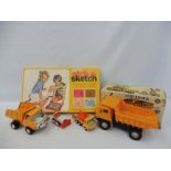 A selection of circa 1970s toys to include a boxed Japanese Dump Truck, Tonka etc.