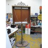 A large scale brass free standing menu holder, possibly French, approx. 84" h.